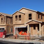Wooden frames of new houses under construction in Elk Grove subdivision.